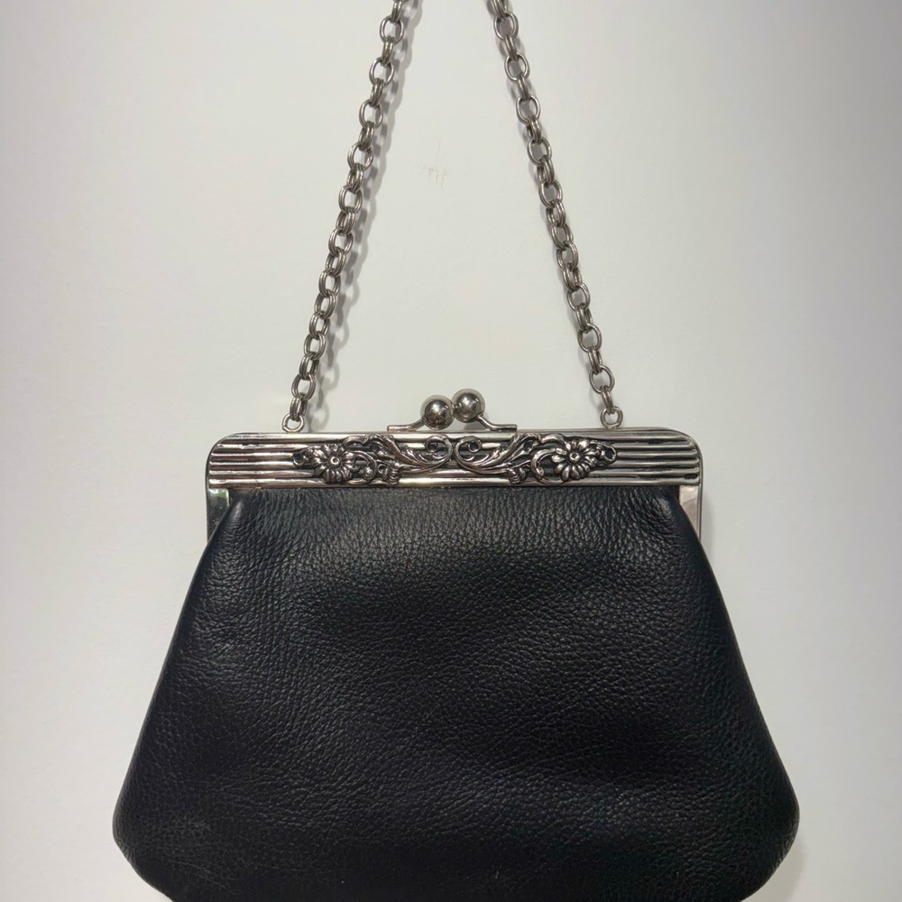 Elegant Black and Silver Clutch with Ornate Frame